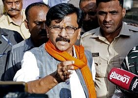 Shiv Sena leader Sanjay Raut speaks to the media while being detained by Enforcement Directorate (ED) in connection with the alleged Patra Chawl land scam, outside his residence, in Mumbai on Sunday, July 31, 2022.