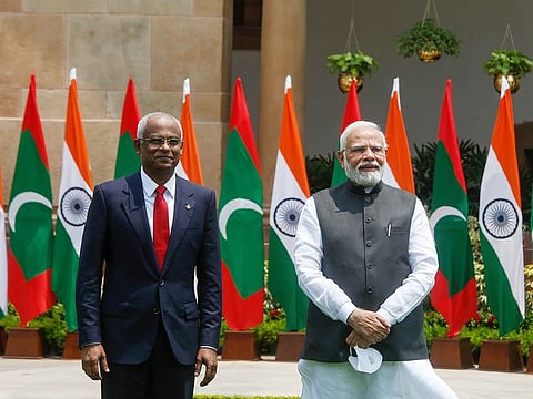 Maldives President Ibrahim Mohamed Solih, left and Indian Prime Minister Narendra Modi pose for the media before their meeting in New Delhi, on Tuesday, August 2, 2022.