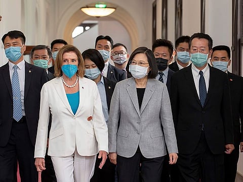 US House Speaker Nancy Pelosi, left, and Taiwanese President President Tsai Ing-wen arrive for a meeting in Taipei, Taiwan, Wednesday, Aug. 3, 2022