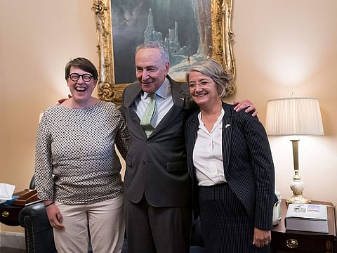 Senate Majority Leader Chuck Schumer, flanked by Paivi Nevala, minister counselor of the Finnish Embassy, left, and Karin Olofsdotter, Sweden’s ambassador to the US, welcomes diplomats just before the Senate vote to ratify NATO membership for the two nations.