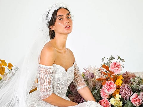 Emirati Hanan Al Siddiki’s hand-crafted gowns feature pearls.