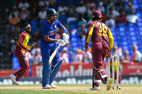 India's Shreyas Iyer (left) walks back after being stumped by Devon Thomas (right) off left-arm spinner Akeal Jerome Hosein during the third Twenty20 against West Indies.