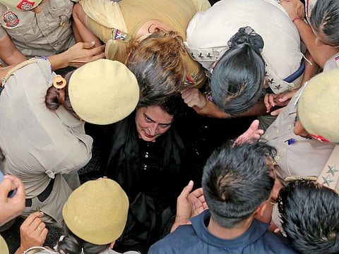 Congress leader Priyanka Gandhi Vadra being detained during a nationwide protest against unemployment and inflation, outside AICC HQ, in New Delhi on Friday, August 5, 2022.