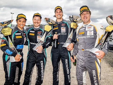 Saudi racer Reema Juffali with her SPS Automotive Performance team members after winning the Bronze Cup class at the 24 Hours of Spa in Belgium.