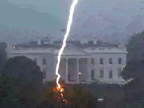 A lightning strike hits a tree in Lafayette Park across from the White House, killing three people and injuring one person below, during an August 4 evening thunderstom as seen in this framegrab from a Reuters TV video camera mounted on a nearby rooftop in Washington.