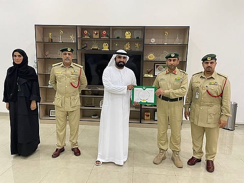 Ali Ahmad Al Ali (centre) exemplifies true values of Emiratis, police said