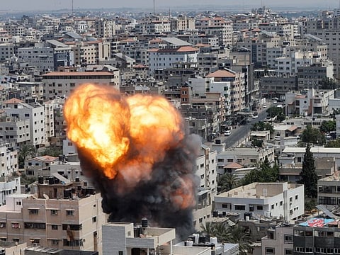 Flames and smoke rise during an Israeli air strike, amid Israel-Gaza fighting, in Gaza City August 6, 2022.