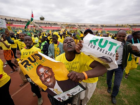 Supporters of Kenyan presidential candidate William Ruto cheer at his final electoral campaign rally at Nyayo stadium in Nairobi, Kenya Saturday, Aug. 6, 2022.