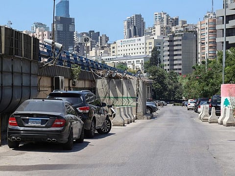 A picture shows a view of a street with access to a detention centre under the Adliyeh (Palace of Justice) bridge (L) of Lebanon's capital Beirut, on August 7, 2022, following a dawn prison break.