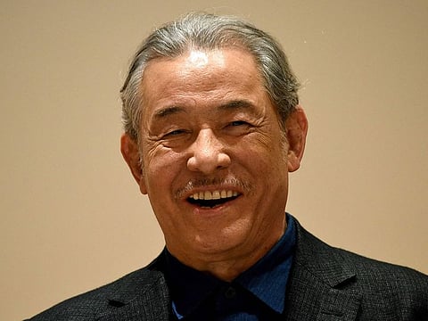 This file photo taken on March 15, 2016 shows Japanese designer Issey Miyake attending a press conference for the Miyake Issey Exhibition at the National Art Center in Tokyo.