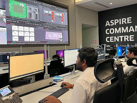 Staff work at the Aspire security command centre for the FIFA World Cup Qatar 2022, near Khalifa International stadium in Doha, where operation and security teams will be able to monitor all the stadiums during the World Cup.