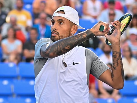 Nick Kyrgios of Australia hits a return against Alex de Minaur of Australia during Day 6 of the National Bank Open at Stade IGA in Montreal, Canada