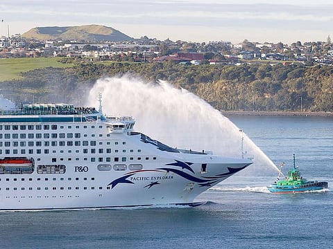 The Pacific Explorer sails into the Waitemata Harbour, in Auckland, New Zealand, Friday, Aug. 12, 2022.
