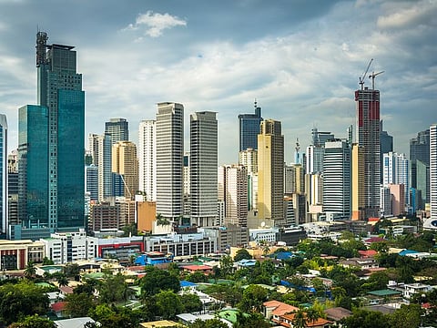 Skyline of Makati, the financial district of Manila. Credit ratings are based on how much money, property, and debt a borrower has and on how well the borrower has paid past debts.
