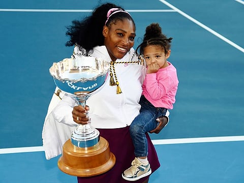 Serena Williams with her daughter Alexis Olympia Ohanian Jr, and the ASB trophy after winning the final against Jessica Pegula at the ASB Classic in Auckland, New Zealand, on January 12, 2020. “...these days, if I have to choose between building my tennis resume and building my family, I choose the latter,” Williams wrote in an essay released August 9, 2022, by Vogue magazine.