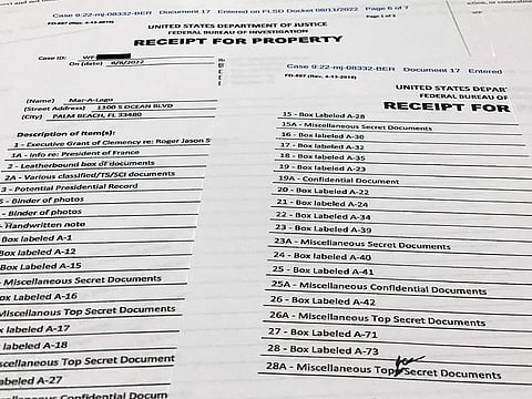 The receipt for property that was seized during the execution of a search warrant by the FBI at former President Donald Trump's Mar-a-Lago estate in Palm Beach, Fla., is photographed Friday, Aug. 12, 2022.