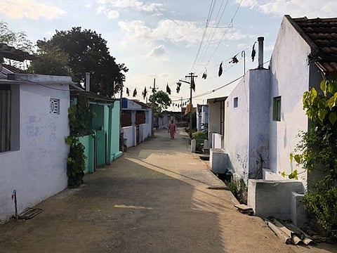 In Periya Negamam, deserted streets welcome the visitors, but a rhythmic din of handloom pits indicate a village full of life and activity.
