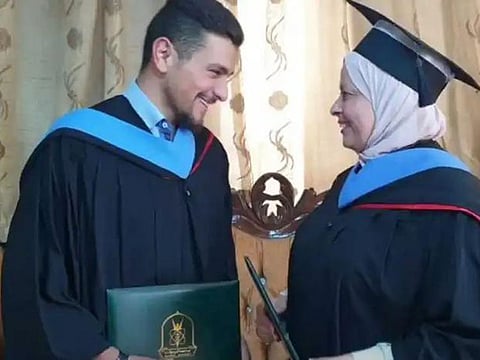 Samira Nusairat with her son Mo’ath after the graduation ceremony.