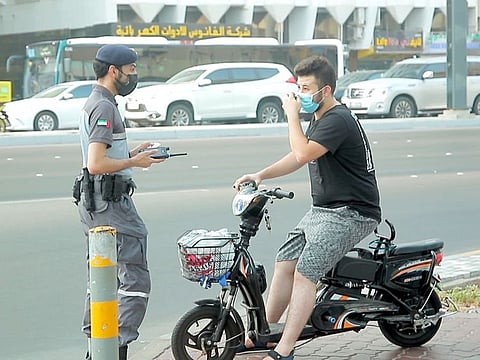 Wearing a helmet and reflective jacket is a must when riding a bicycle or scooter, police say