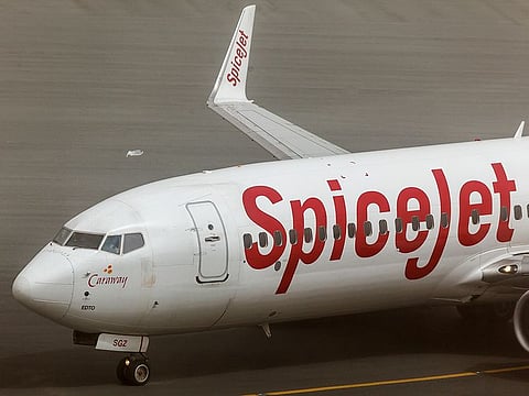 A Pune-bound SpiceJet flight at the IGI airport was evacuated and thoroughly searched after a call about the presence of bomb in the aircraft was received on Thursday evening.