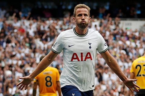 Tottenham Hotspur's English striker Harry Kane celebrates after scoring the first goal during the English Premier League match against Wolverhampton Wanderers on Saturday.