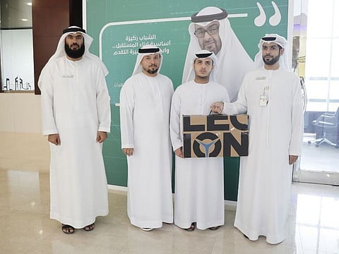 Ali Saleh Ali Sharif, second from right, with Dubai Police officials.