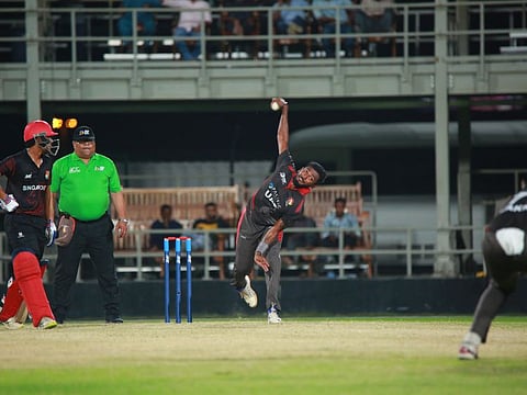 Leg-spinner Karthik Meiyappan produced a match-winning three-wicket spell that guided the UAE to 47-run win over Singapore at Al Amerat grounds in Oman on Monday.