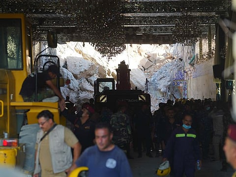 Emergency services and rescue workers at Qattarat Al Imam Ali shrine near Karbala.