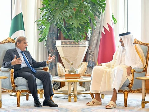 Pakistan Prime Minister Shehbaz Sharif meets Qatar Emir Sheikh Tamim bin Hamad Al Thani in Doha on August 24, 2022.