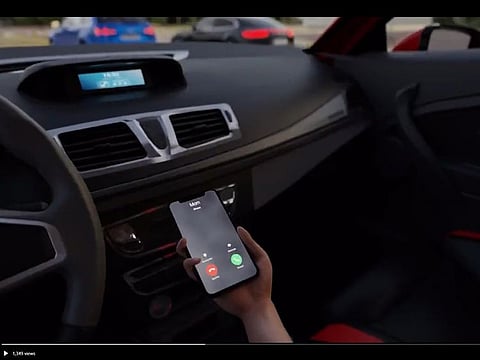 Using handheld devices while driving causes distraction, say Abu Dhabi Police.