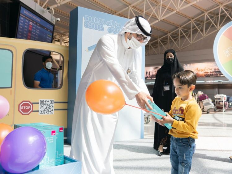 Children arriving at Sharjah International Airport this week receiving a surprise reception with gifts and candies.