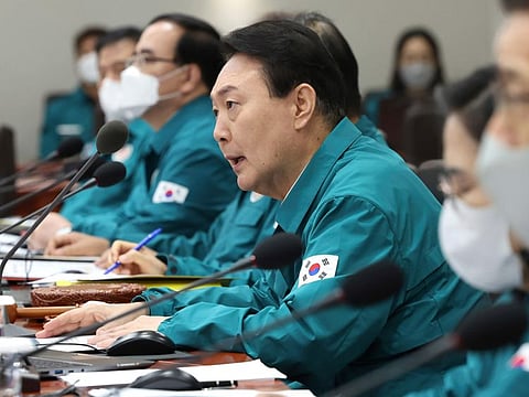 South Korean President Yoon Suk Yeol, presides over a Cabinet meeting at the presidential office in Seoul.