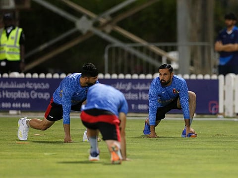 Afghanistan skipper Mohammad Nabi limbering up with his teammates at the ICC Academy grounds ahead of the DP World Asia Cup opener.