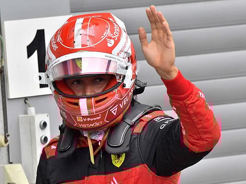 Ferrari's Spanish driver Carlos Sainz Jr reacts after winning the qualifying session for the Belgian Formula One Grand Prix at Spa-Francorchamps racetrack in Spa.
