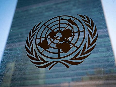 The symbol of the United Nations is displayed outside the Secretariat Building during an emergency meeting of the UN General Assembly, Monday, Feb. 28, 2022, at the United Nations Headquarters, in New York.