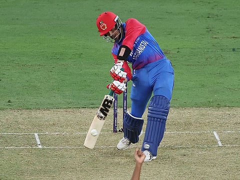 Afghanistan's Rahmanullah Gurbaz plays a shot during the Asia Cup Twenty20 International cricket Group B match between Sri Lanka and Afghanistan at the Dubai International Cricket Stadium in Dubai.