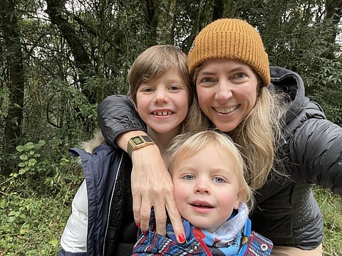 Lorien with sons Rupert and Jack (centre)