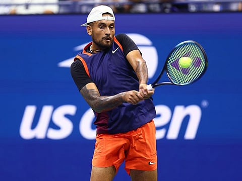 Nick Kyrgios plays a backhand against Thanasi Kokkinakis during the Men's Singles First Round on Day One of the 2022 US Open at USTA Billie Jean King National Tennis Center in the Flushing neighborhood of the Queens borough of New York City.