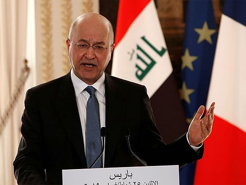 Iraqi President Barham Salih speaks during a news conference