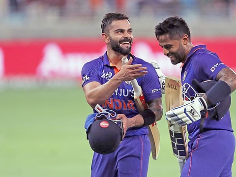 India's Virat Kohli and Suryakumar Yadav leave the field after their innings during the Asia Cup 2022 Group A match with Hongkong, at Dubai International Cricket Stadium in Dubai on Wednesday.