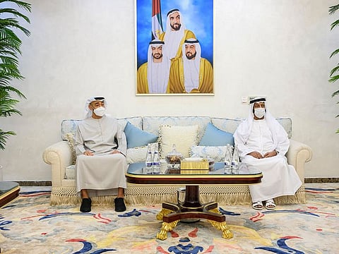 President His Highness Sheikh Mohamed Bin Zayed Al Nahyan offers condolences to Mohamed bin Rakkad Al Ameri, right, on the passing of Rakkad bin Salem Al Ameri.