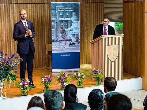 Omar Sultan Al Olama (left), Minister of State for Artificial Intelligence, Digital Economy, and Remote Work Applications at the graduation ceremony in Oxford