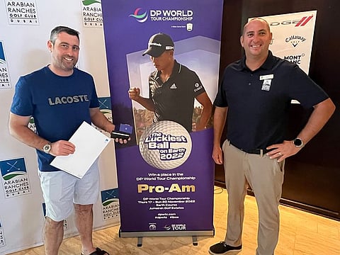 Andrew Partridge (left) winner of the Rivoli Monthly Medal Net B Division and Luckiest Ball on Earth with Ryan Smith, Golf Operations at Arabian Ranches Golf Club.