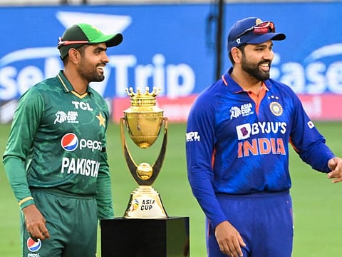 India captain Rohit Sharma (right) and Pakistan captain Babar Azam.