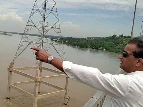 Pakistan Floods 2022: Malik Amin Aslam watches the deluge passing under Attock bridge over confluence of River Indus and Kabul rivers on August 29, 2022.