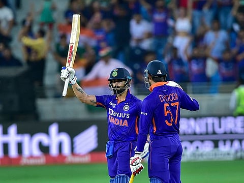 Virat Kohli of India celebrates scoring a half century against Pakistan during the Super 4 Asia Cup 2022 clash at the Dubai International Cricket Stadium.
