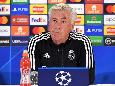 Real Madrid's Italian coach Carlo Ancelotti reacts as he speaks during a press conference at Celtic Park in Glasgow ahead of their UEFA Champions League Group F football match against Celtic.