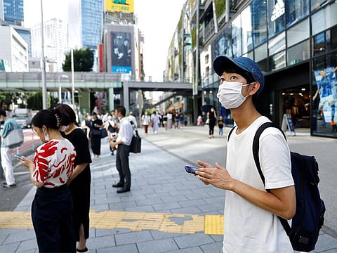 Shoji Morimoto who charges 10,000 yen ($71.30) an hour to accompany clients and simply exist as a companion, makes his way to meet his client in Tokyo, Japan.