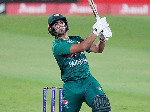 Pakistan's Naseem Shah hits a six during the Super Four T20 cricket match of Asia Cup against Afghanistan, in Sharjah, on Wednesday, Septem 7, 2022.