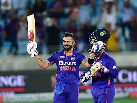 Virat Kohli of India reacts after reaching his century against Afghanistan during the DP World Asia Cup game at the Dubai International Stadium on September 8, 2022.